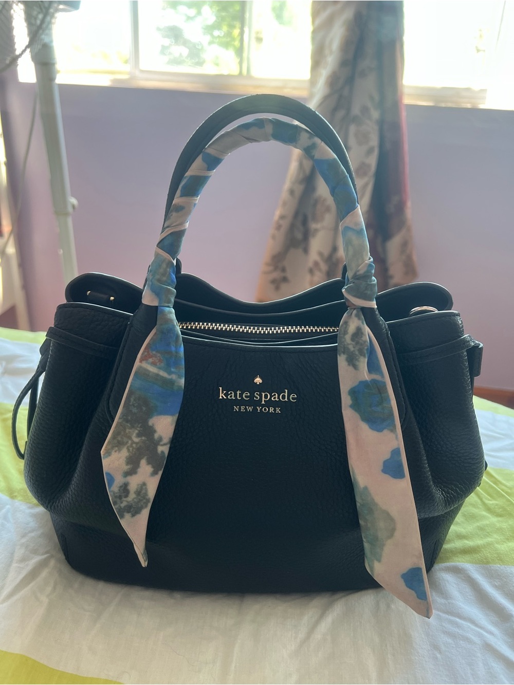 Kate Spade black pebbled leather satchel with gold logo
